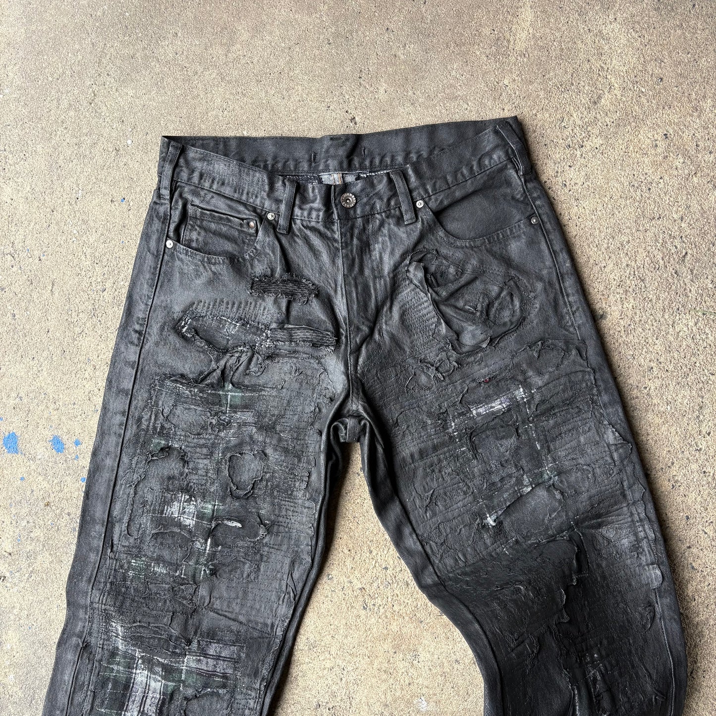 “Molt” coated denim