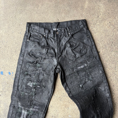 “Molt” coated denim