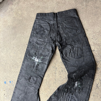 “Molt” coated denim