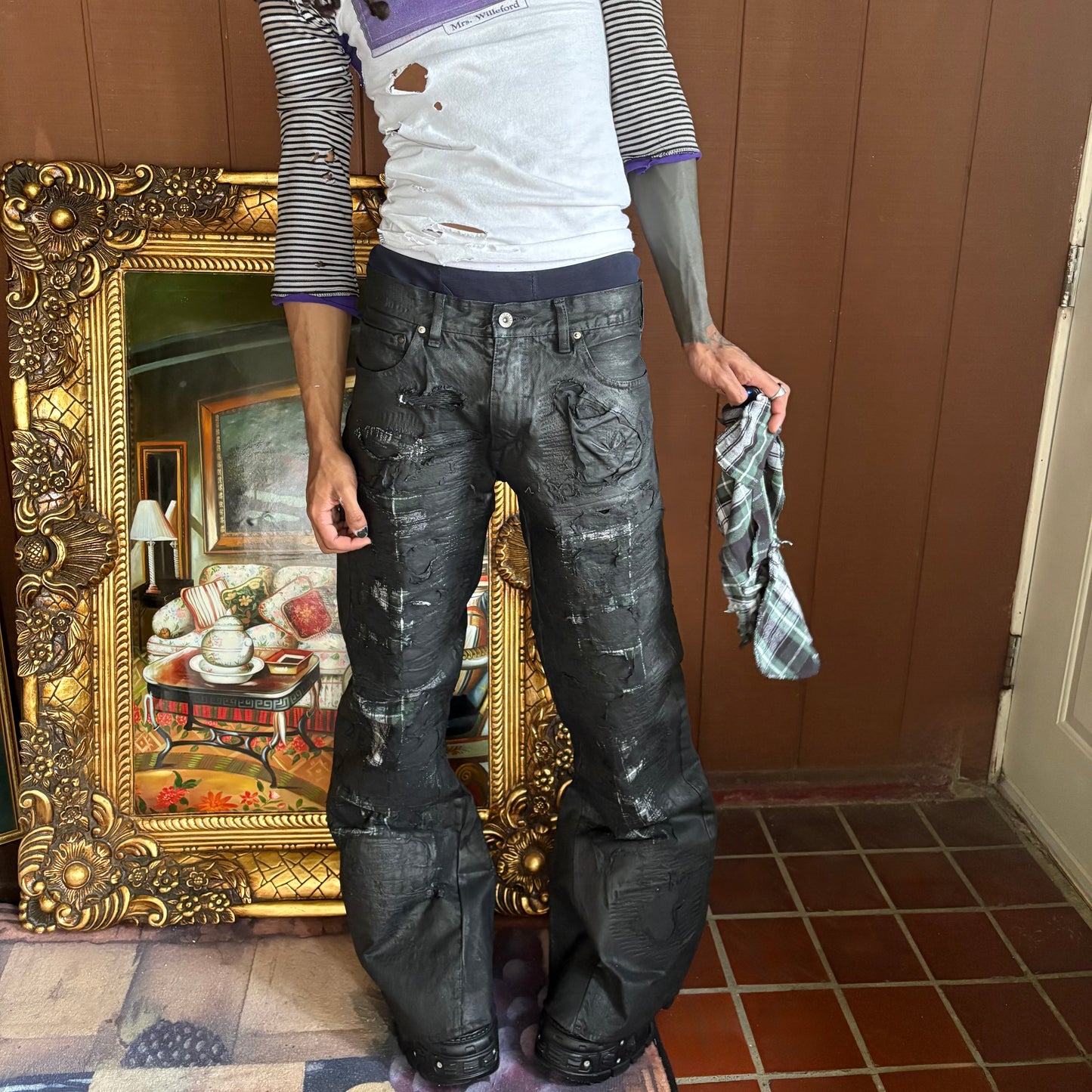 “Molt” coated denim