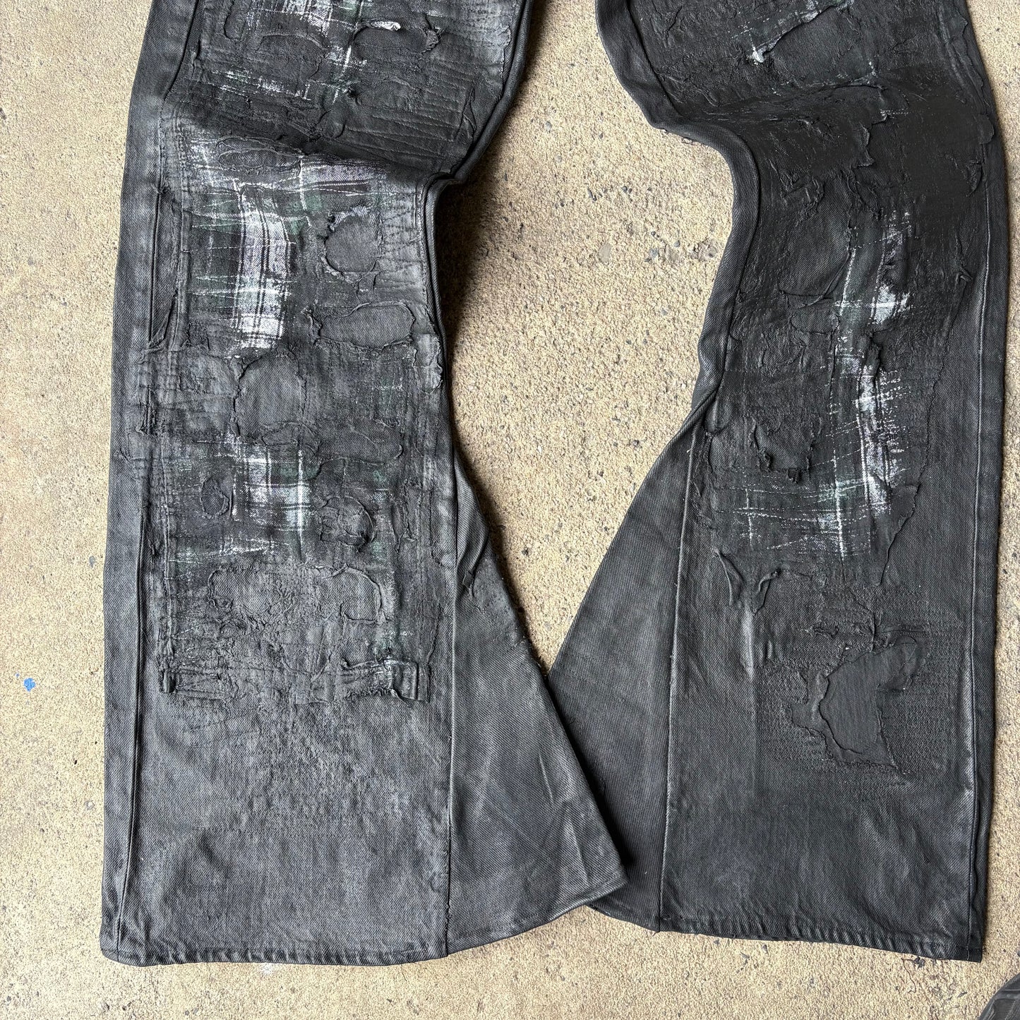 “Molt” coated denim