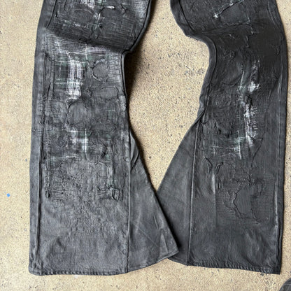 “Molt” coated denim