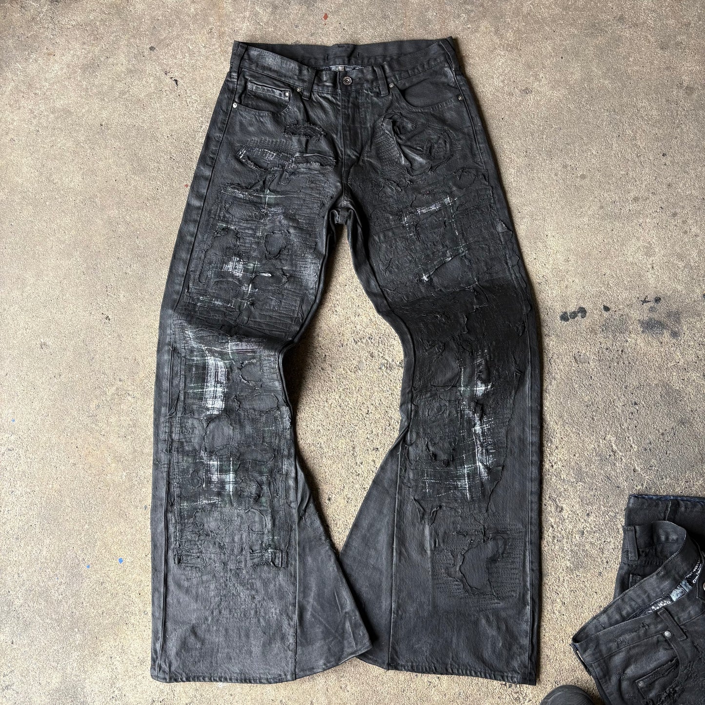 “Molt” coated denim