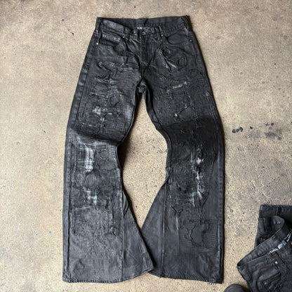 “Molt” coated denim