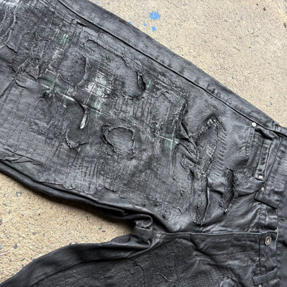 “Molt” coated denim